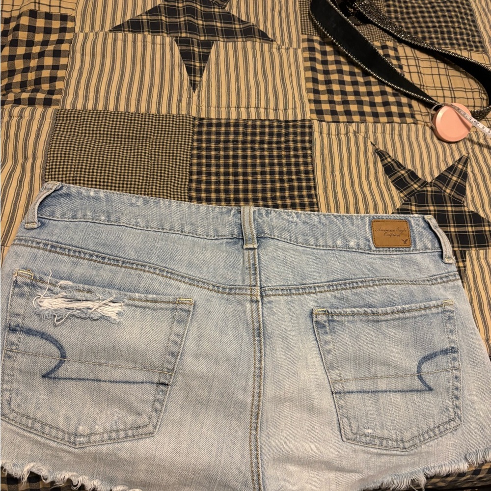 American Eagle Outfitters Light Blue Denim shirts size 10 destroyed line